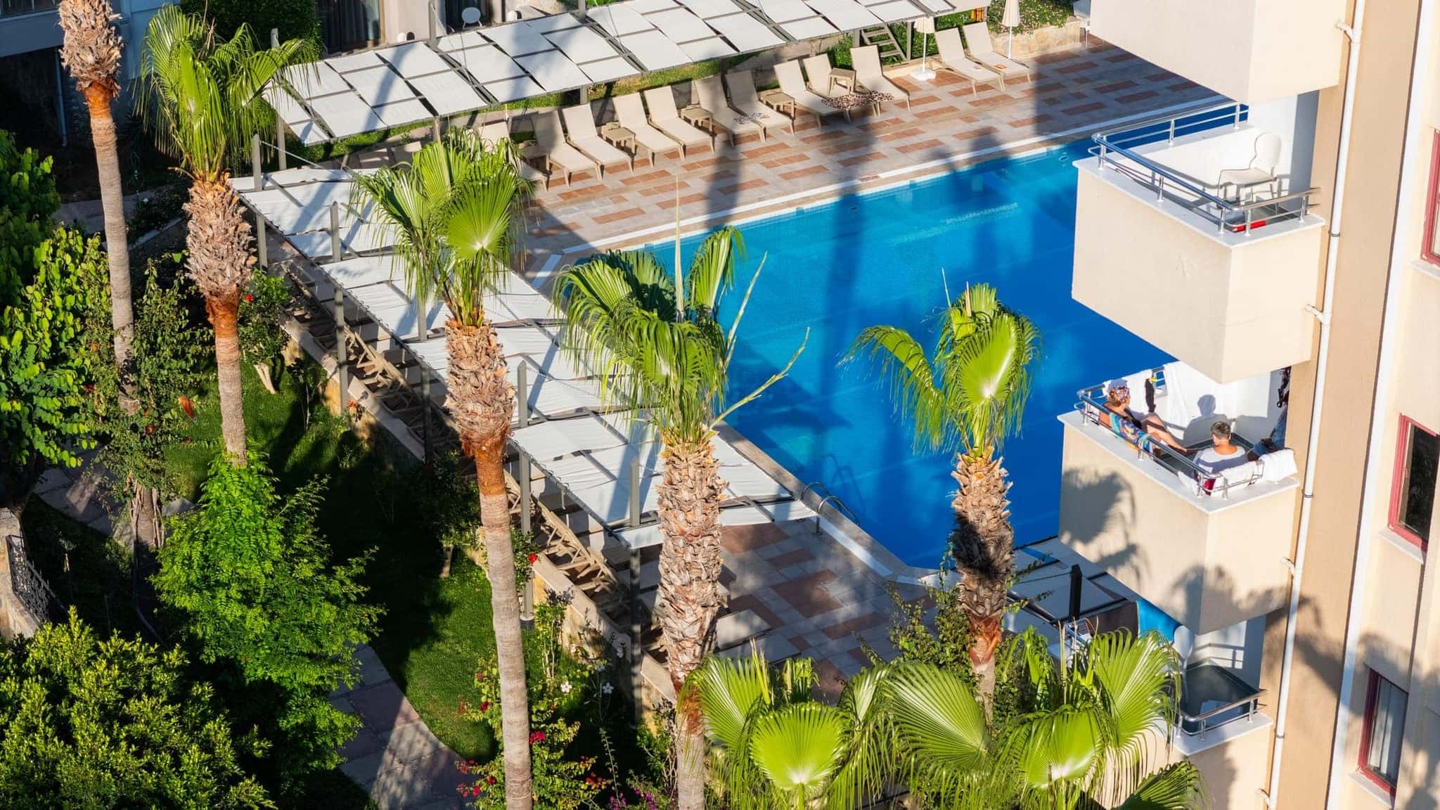 Sarıtaş Hotel Alanya outdoor swimming pool, water slide pool and poolside bar